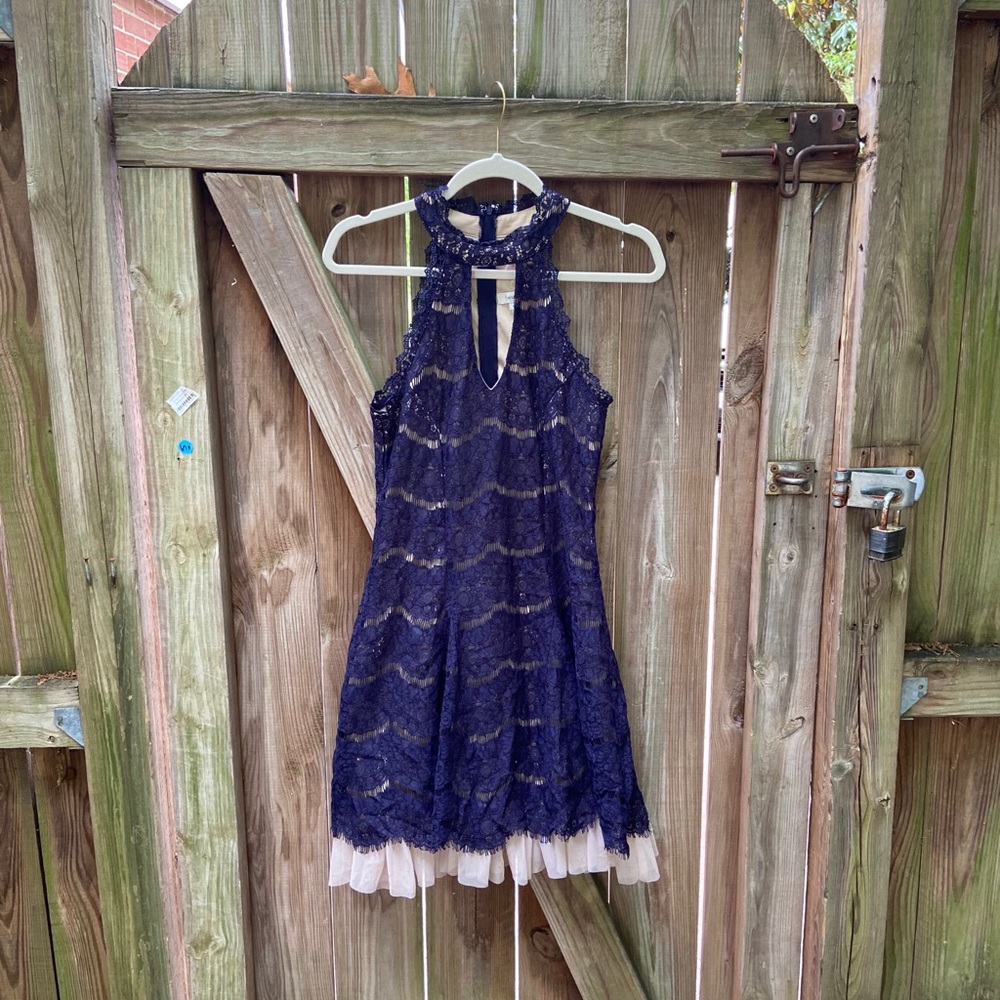 Francesca’s beautiful sleeveless lace dress